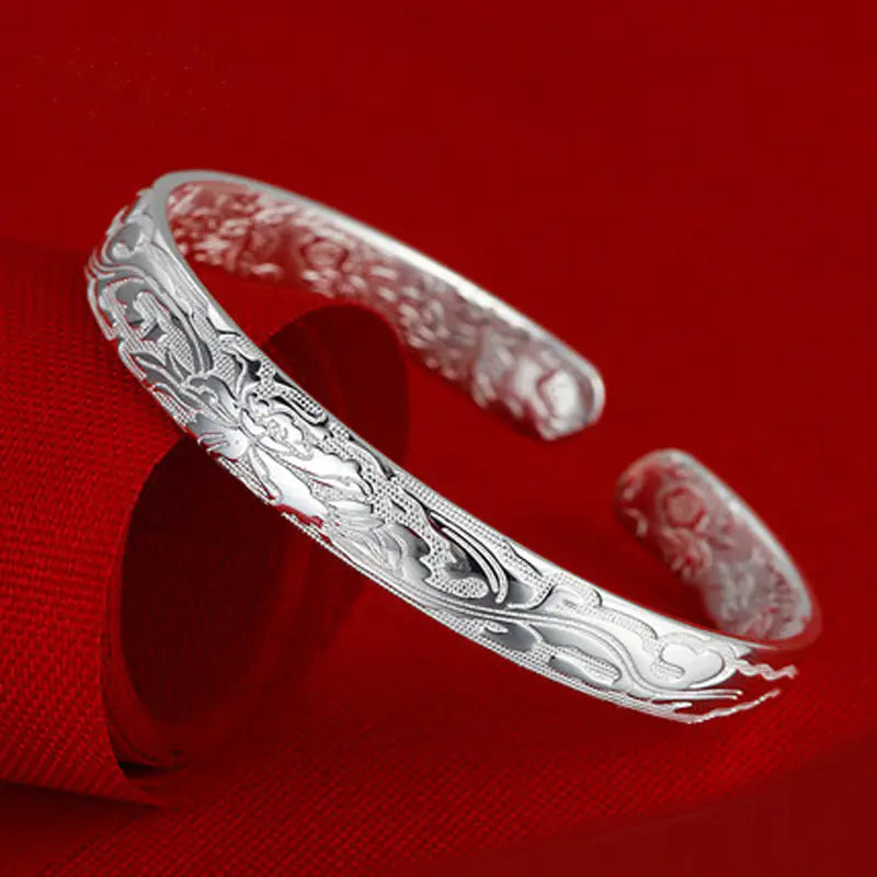 Solid Silver Flower Bracelet with Adjustable Design