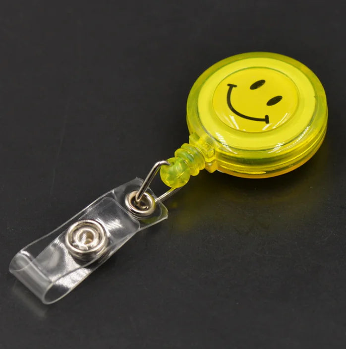 Smiley Face Badge Reel with Retractable Strap and Holder