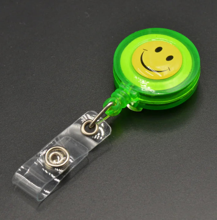 Smiley Face Badge Reel with Retractable Strap and Holder