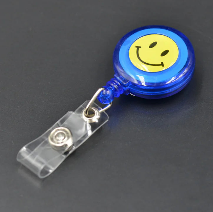 Smiley Face Badge Reel with Retractable Strap and Holder