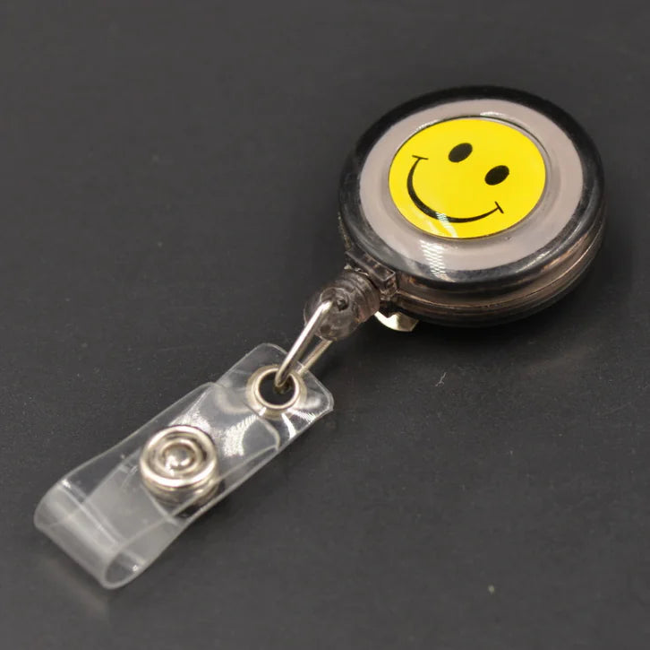 Smiley Face Badge Reel with Retractable Strap and Holder